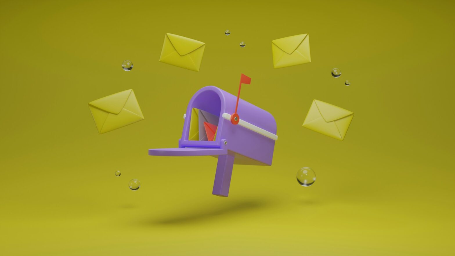A purple mailbox surrounded by envelopes