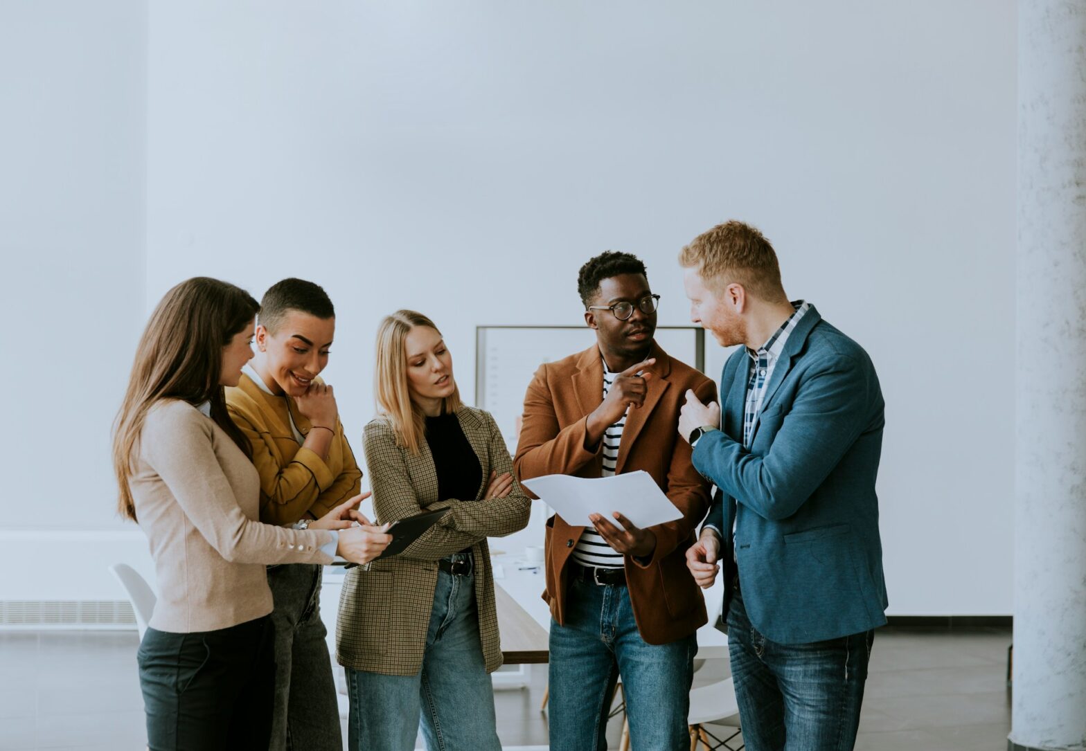 Group of people standing while talking