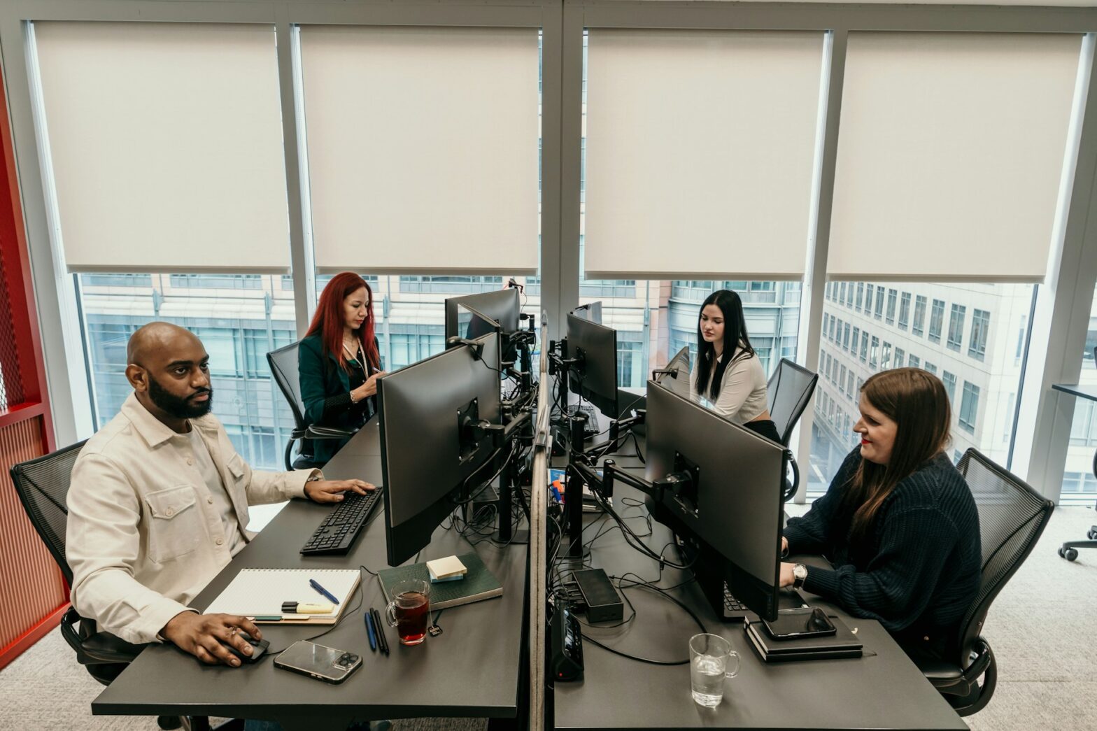 Group of employees in front of their computers