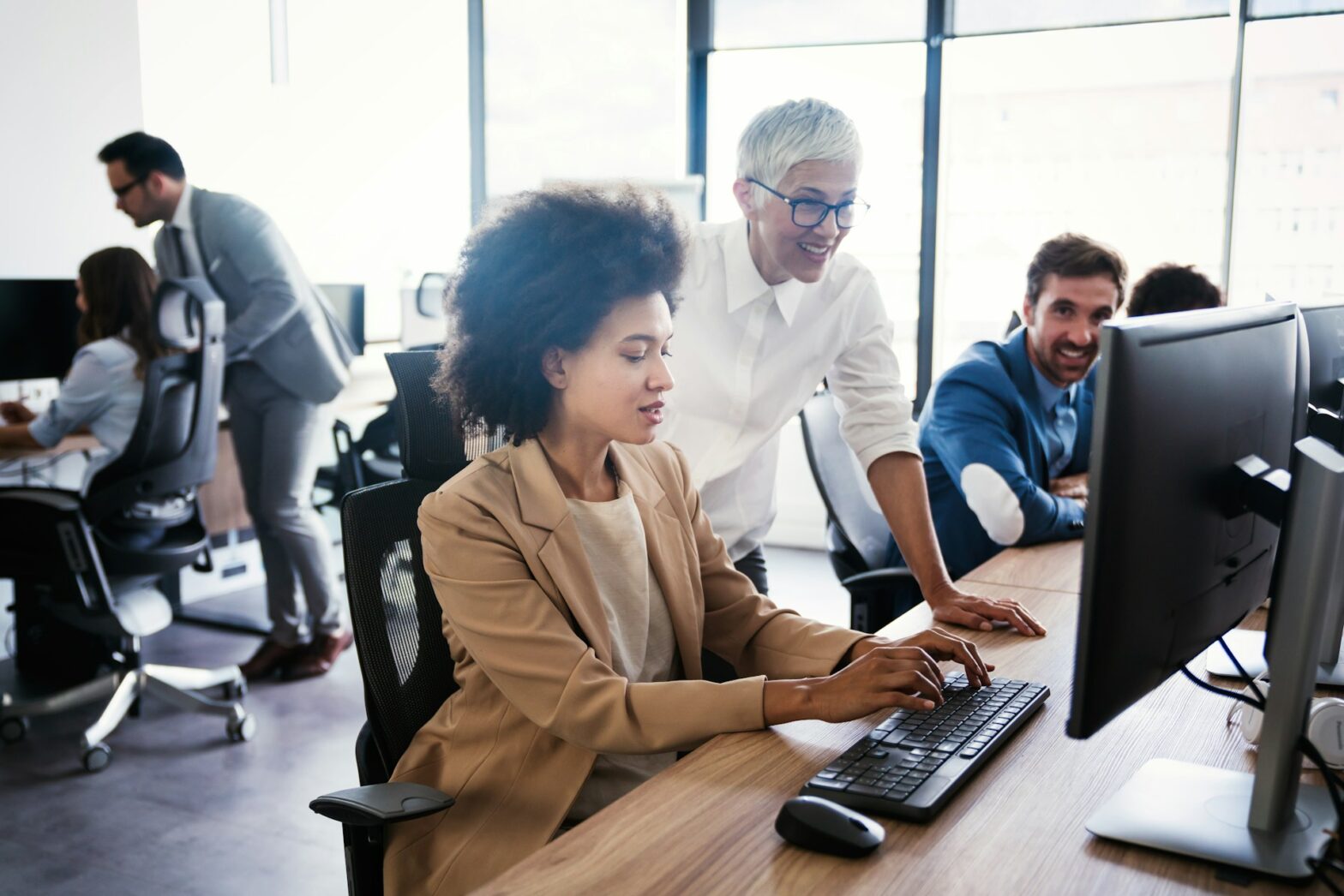 Employee typing on a computer